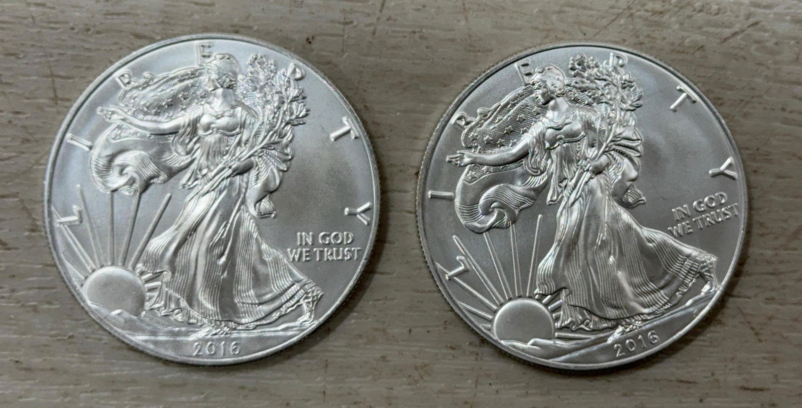 2- 2016 SILVER EAGLES: IMPORTANT, WE ONLY ACCEPT CREDIT CARDS UP TO $500 FOR ONLINE COIN PURCHASES. YOU CAN PAY ACH THROUGH PROXIBID, OR YOU CAN SEND A WIRE OR CERTIFIED CHECK. WE WILL HOLD ALL SHIPPING OF COINS FOR 10