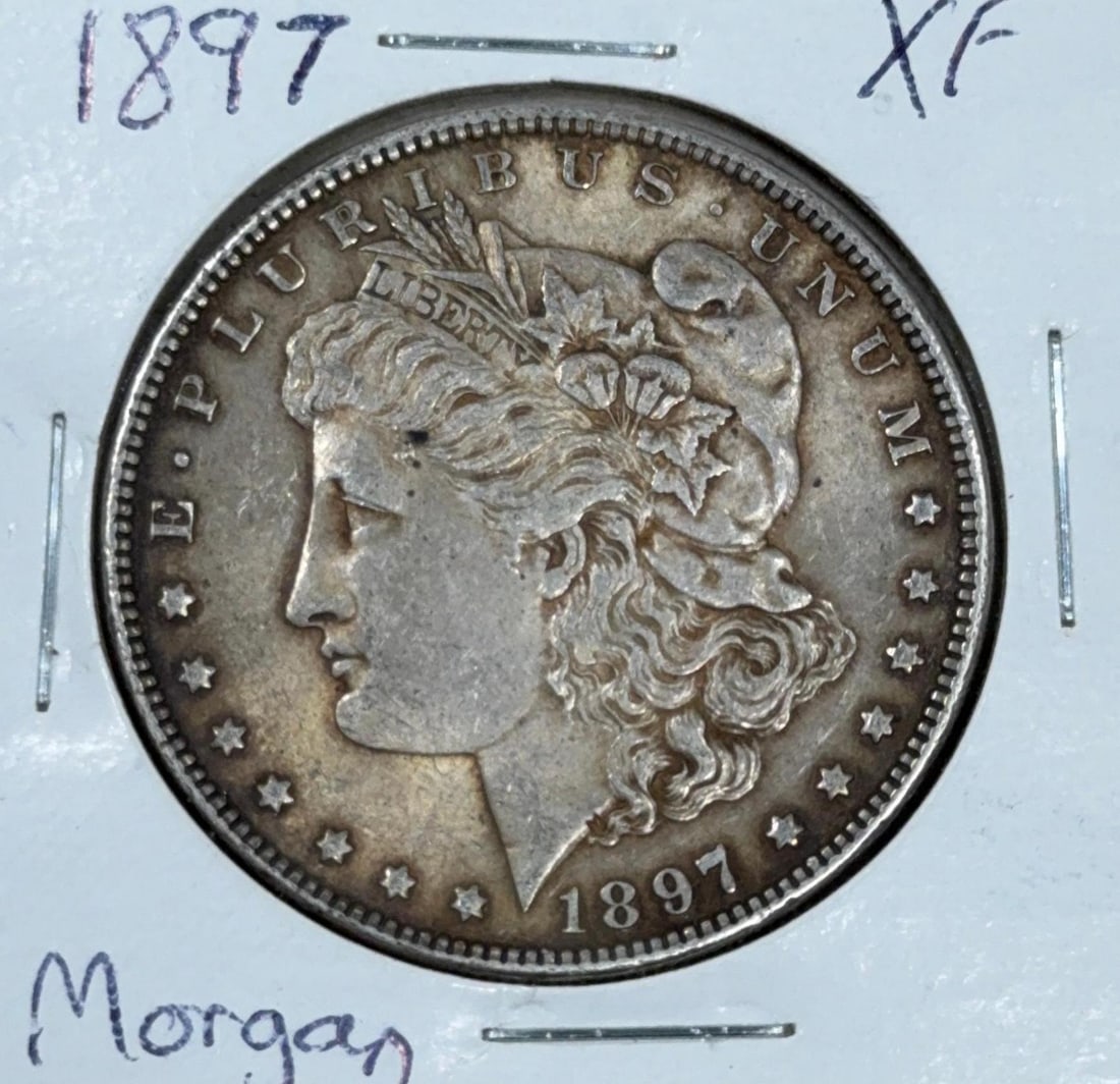 1897 Morgan Dollar Coin, United States, 90% Silver: IMPORTANT, WE ONLY ACCEPT CREDIT CARDS UP TO $500 FOR ONLINE COIN PURCHASES. YOU CAN PAY ACH THROUGH PROXIBID, OR YOU CAN SEND A WIRE OR CERTIFIED CHECK. WE WILL HOLD ALL SHIPPING OF COINS FOR 10