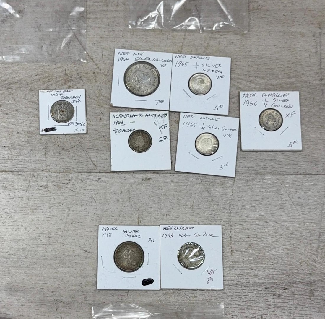 Collection of Various Silver Coins Including Netherlands and New Zealand: IMPORTANT, WE ONLY ACCEPT CREDIT CARDS UP TO $500 FOR ONLINE COIN PURCHASES. YOU CAN PAY ACH THROUGH PROXIBID, OR YOU CAN SEND A WIRE OR CERTIFIED CHECK. WE WILL HOLD ALL SHIPPING OF COINS FOR 10 DAYS