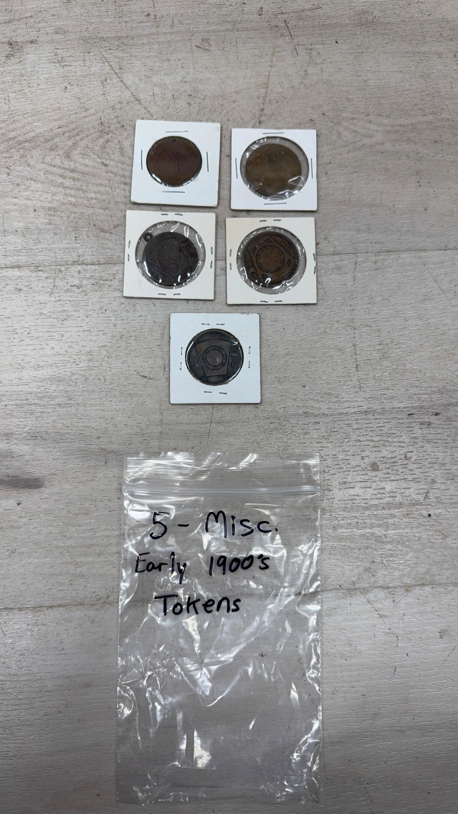 Early 1900s Miscellaneous Tokens Collection, Various Issuers: IMPORTANT, WE ONLY ACCEPT CREDIT CARDS UP TO $500 FOR ONLINE COIN PURCHASES. YOU CAN PAY ACH THROUGH PROXIBID, OR YOU CAN SEND A WIRE OR CERTIFIED CHECK. WE WILL HOLD ALL SHIPPING OF COINS FOR 10