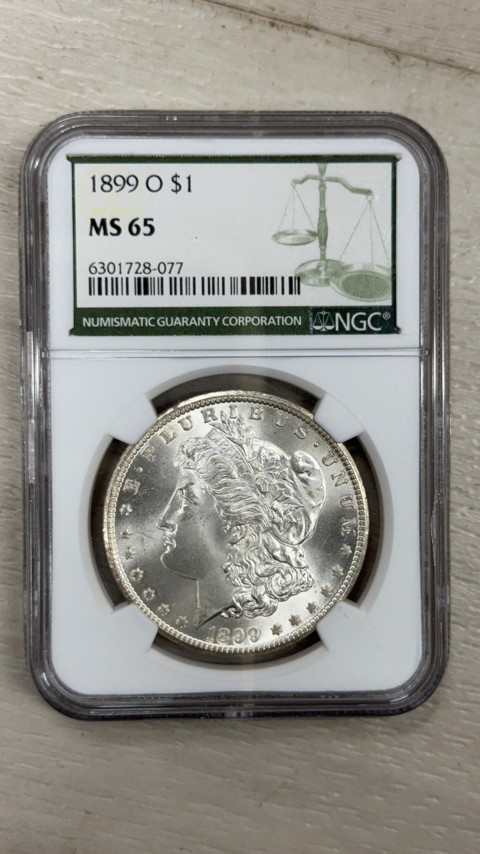 1899 O Morgan Dollar, MS 65, NGC Certified, One Dollar Coin (1 of 4)