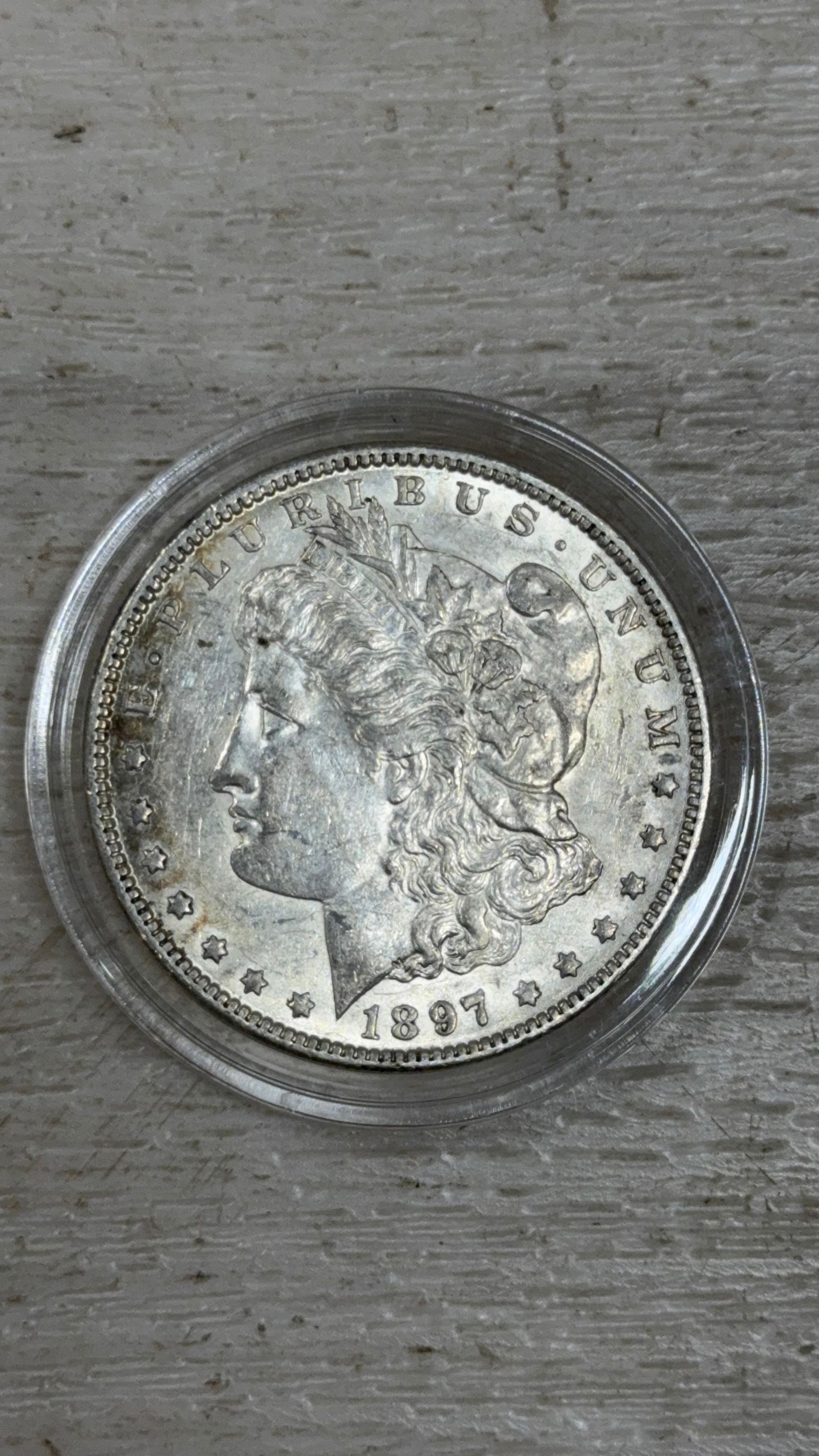 1897-O Morgan Silver Dollar, 90% silver: IMPORTANT, WE ONLY ACCEPT CREDIT CARDS UP TO $500 FOR ONLINE COIN PURCHASES. YOU CAN PAY ACH THROUGH PROXIBID, OR YOU CAN SEND A WIRE OR CERTIFIED CHECK. WE WILL HOLD ALL SHIPPING OF COINS FOR 10 DAYS
