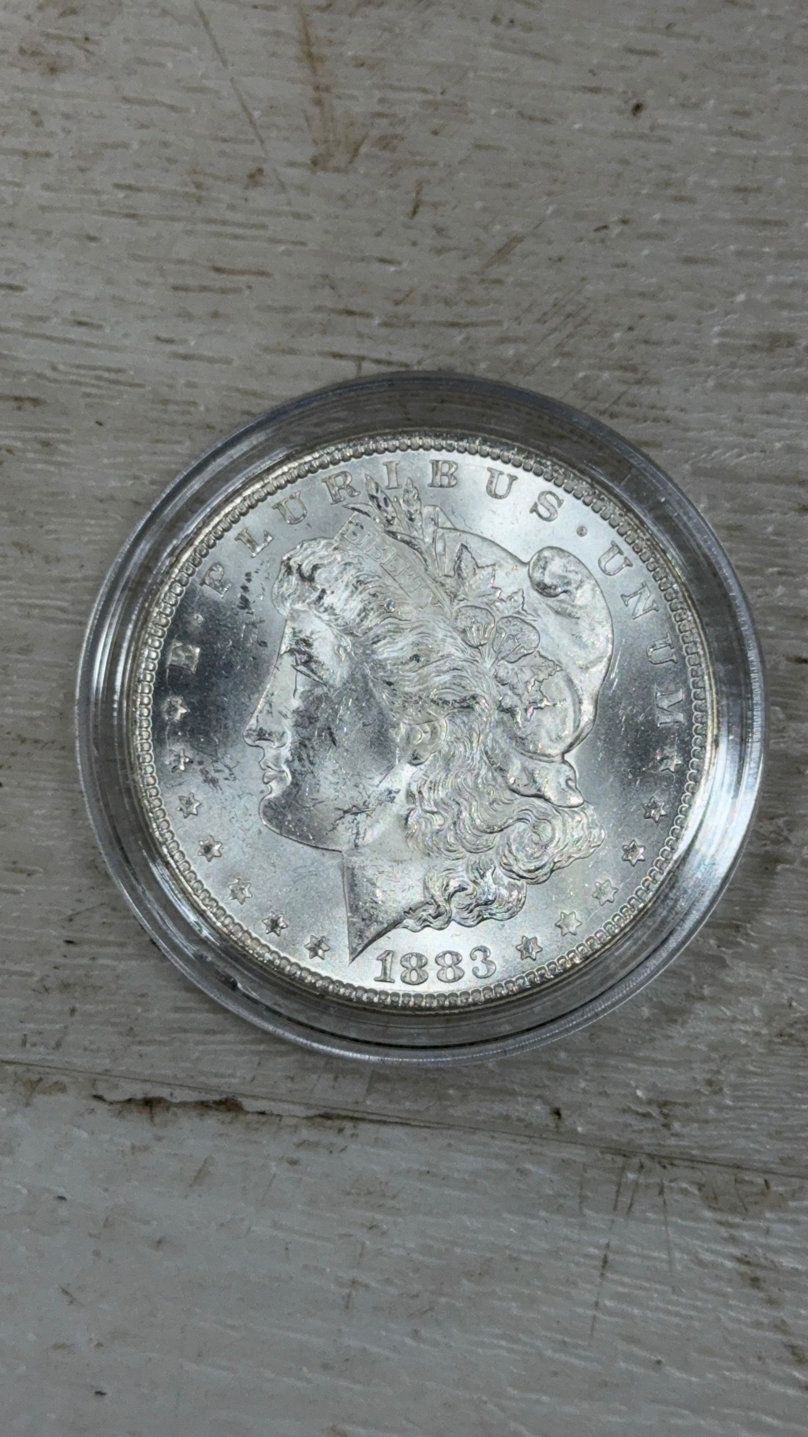 1883-CC US Morgan Silver Dollar, 90% silver: IMPORTANT, WE ONLY ACCEPT CREDIT CARDS UP TO $500 FOR ONLINE COIN PURCHASES. YOU CAN PAY ACH THROUGH PROXIBID, OR YOU CAN SEND A WIRE OR CERTIFIED CHECK. WE WILL HOLD ALL SHIPPING OF COINS FOR 10 DAYS