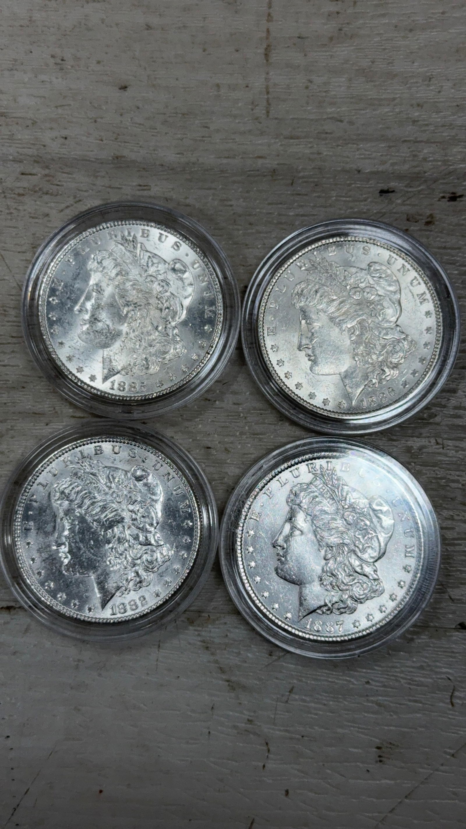 4- Morgan Silver Dollars, 1885, 1886, 1887, 1882, 90% silver (1 of 9)