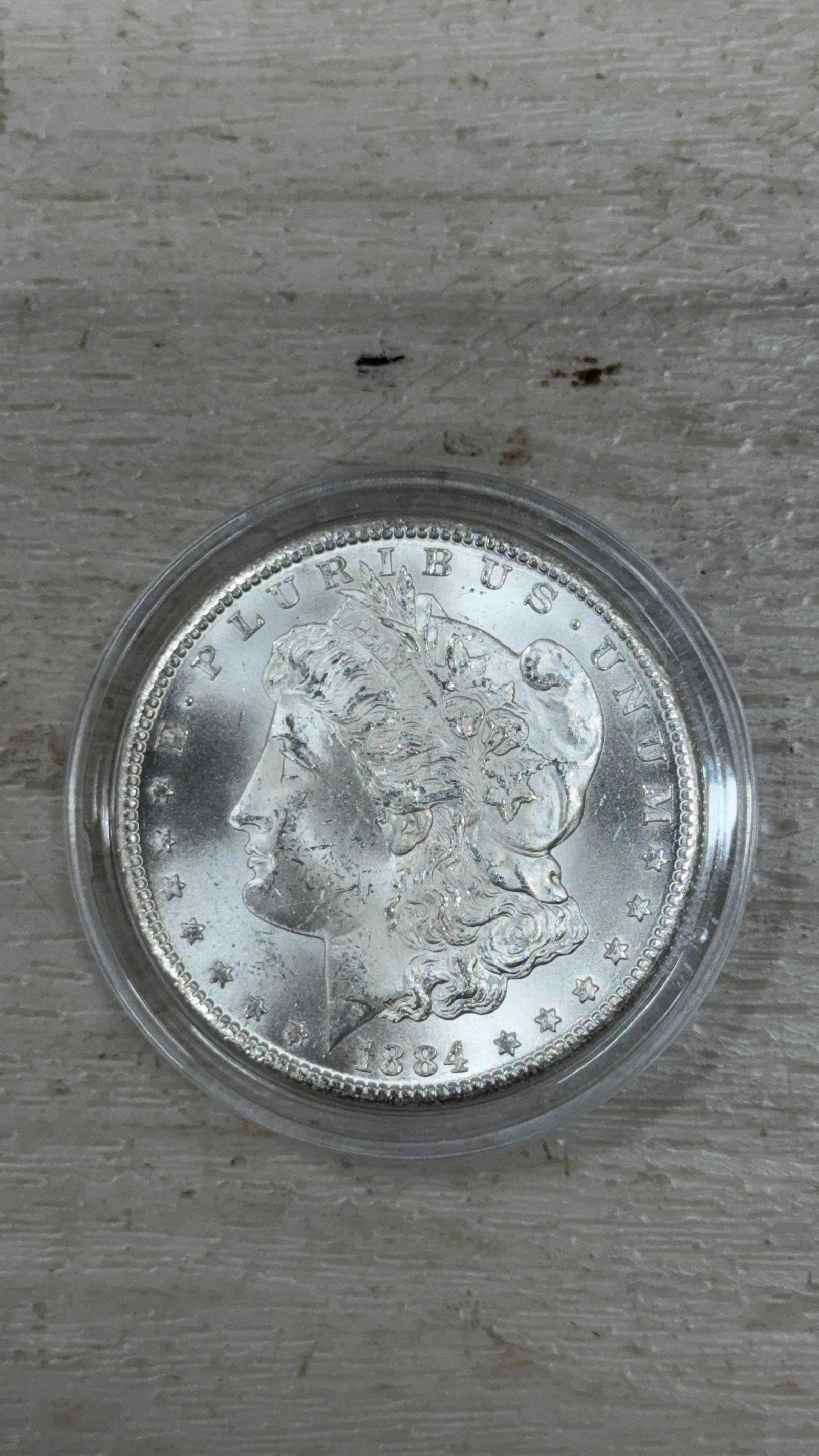 1884-CC Morgan Silver Dollar, Carson City Mint: IMPORTANT, WE ONLY ACCEPT CREDIT CARDS UP TO $500 FOR ONLINE COIN PURCHASES. YOU CAN PAY ACH THROUGH PROXIBID, OR YOU CAN SEND A WIRE OR CERTIFIED CHECK. WE WILL HOLD ALL SHIPPING OF COINS FOR 10 DAYS