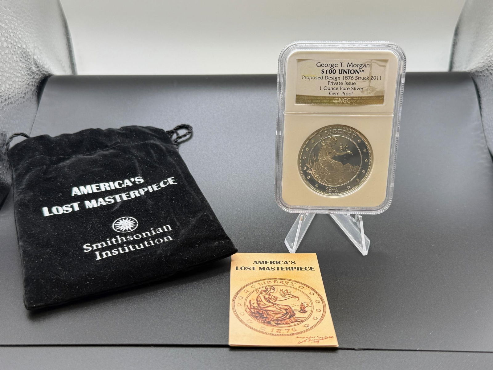 $100 Union Commemorative Coin, 1 Ounce Silver, George T. Morgan Design in NGC Holder: IMPORTANT, WE ONLY ACCEPT CREDIT CARDS UP TO $500 FOR ONLINE COIN PURCHASES. YOU CAN PAY ACH THROUGH PROXIBID, OR YOU CAN SEND A WIRE OR CERTIFIED CHECK. WE WILL HOLD ALL SHIPPING OF COINS FOR 10 DAYS