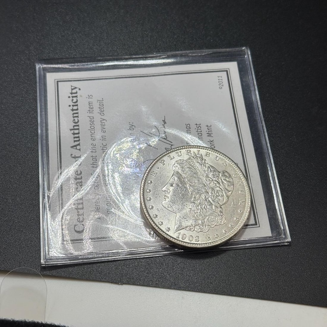 1902-O US Morgan Silver Dollar, 90% silver: IMPORTANT, WE ONLY ACCEPT CREDIT CARDS UP TO $500 FOR ONLINE COIN PURCHASES. YOU CAN PAY ACH THROUGH PROXIBID, OR YOU CAN SEND A WIRE OR CERTIFIED CHECK. WE WILL HOLD ALL SHIPPING OF COINS FOR 10 DAYS