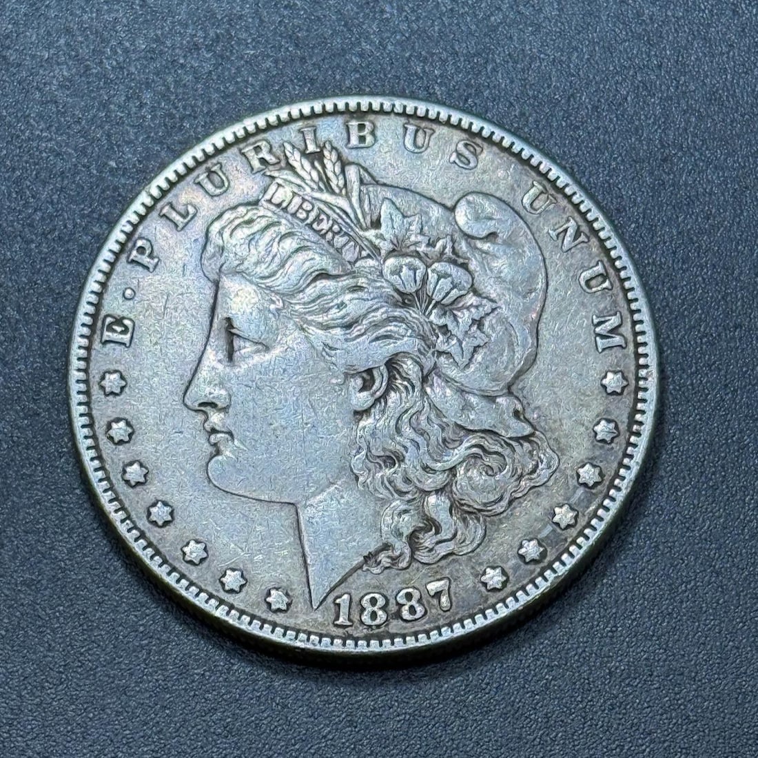 1887 Morgan Dollar Coin, United States, 90% Silver: IMPORTANT, WE ONLY ACCEPT CREDIT CARDS UP TO $500 FOR ONLINE COIN PURCHASES. YOU CAN PAY ACH THROUGH PROXIBID, OR YOU CAN SEND A WIRE OR CERTIFIED CHECK. WE WILL HOLD ALL SHIPPING OF COINS FOR 10 DAYS