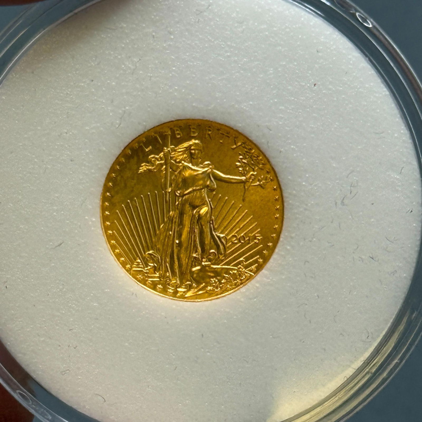2015 1/10 oz American Gold Eagle BU: IMPORTANT, WE ONLY ACCEPT CREDIT CARDS UP TO $500 FOR ONLINE COIN PURCHASES. YOU CAN PAY ACH THROUGH PROXIBID, OR YOU CAN SEND A WIRE OR CERTIFIED CHECK. WE WILL HOLD ALL SHIPPING OF COINS FOR 10 DAYS