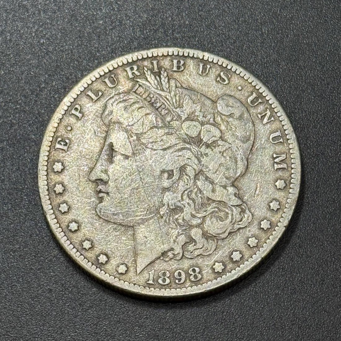 1898-O Morgan Dollar Coin, United States, 90% Silver: IMPORTANT, WE ONLY ACCEPT CREDIT CARDS UP TO $500 FOR ONLINE COIN PURCHASES. YOU CAN PAY ACH THROUGH PROXIBID, OR YOU CAN SEND A WIRE OR CERTIFIED CHECK. WE WILL HOLD ALL SHIPPING OF COINS FOR 10 DAYS