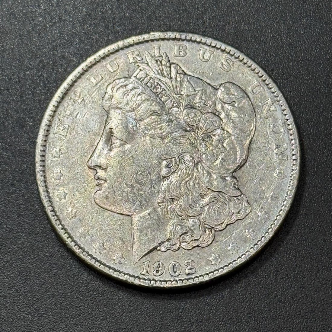 1902 Morgan Dollar Coin, United States, 90% Silver: IMPORTANT, WE ONLY ACCEPT CREDIT CARDS UP TO $500 FOR ONLINE COIN PURCHASES. YOU CAN PAY ACH THROUGH PROXIBID, OR YOU CAN SEND A WIRE OR CERTIFIED CHECK. WE WILL HOLD ALL SHIPPING OF COINS FOR 10 DAYS