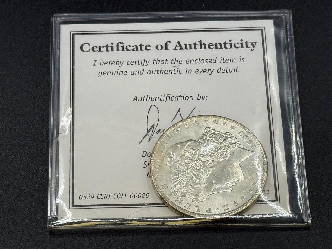 1902-O US Morgan Silver Dollar, 90% silver: IMPORTANT, WE ONLY ACCEPT CREDIT CARDS UP TO $500 FOR ONLINE COIN PURCHASES. YOU CAN PAY ACH THROUGH PROXIBID, OR YOU CAN SEND A WIRE OR CERTIFIED CHECK. WE WILL HOLD ALL SHIPPING OF COINS FOR 10 DAYS