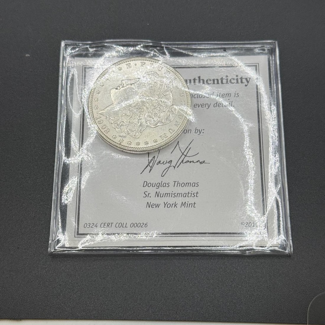 1902-O US Morgan Silver Dollar, 90% silver: IMPORTANT, WE ONLY ACCEPT CREDIT CARDS UP TO $500 FOR ONLINE COIN PURCHASES. YOU CAN PAY ACH THROUGH PROXIBID, OR YOU CAN SEND A WIRE OR CERTIFIED CHECK. WE WILL HOLD ALL SHIPPING OF COINS FOR 10 DAYS