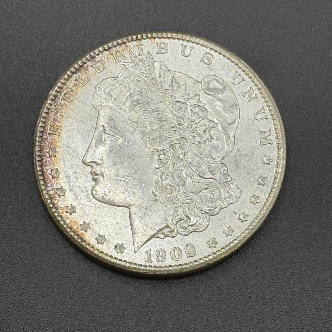 1902-O US Morgan Silver Dollar, 90% silver: IMPORTANT, WE ONLY ACCEPT CREDIT CARDS UP TO $500 FOR ONLINE COIN PURCHASES. YOU CAN PAY ACH THROUGH PROXIBID, OR YOU CAN SEND A WIRE OR CERTIFIED CHECK. WE WILL HOLD ALL SHIPPING OF COINS FOR 10 DAYS