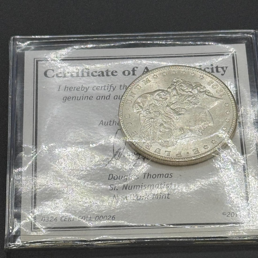 1902-O US Morgan Silver Dollar, 90% silver: IMPORTANT, WE ONLY ACCEPT CREDIT CARDS UP TO $500 FOR ONLINE COIN PURCHASES. YOU CAN PAY ACH THROUGH PROXIBID, OR YOU CAN SEND A WIRE OR CERTIFIED CHECK. WE WILL HOLD ALL SHIPPING OF COINS FOR 10 DAYS