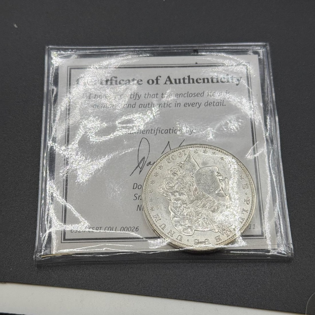 1902-O US Morgan Silver Dollar, 90% silver: IMPORTANT, WE ONLY ACCEPT CREDIT CARDS UP TO $500 FOR ONLINE COIN PURCHASES. YOU CAN PAY ACH THROUGH PROXIBID, OR YOU CAN SEND A WIRE OR CERTIFIED CHECK. WE WILL HOLD ALL SHIPPING OF COINS FOR 10 DAYS