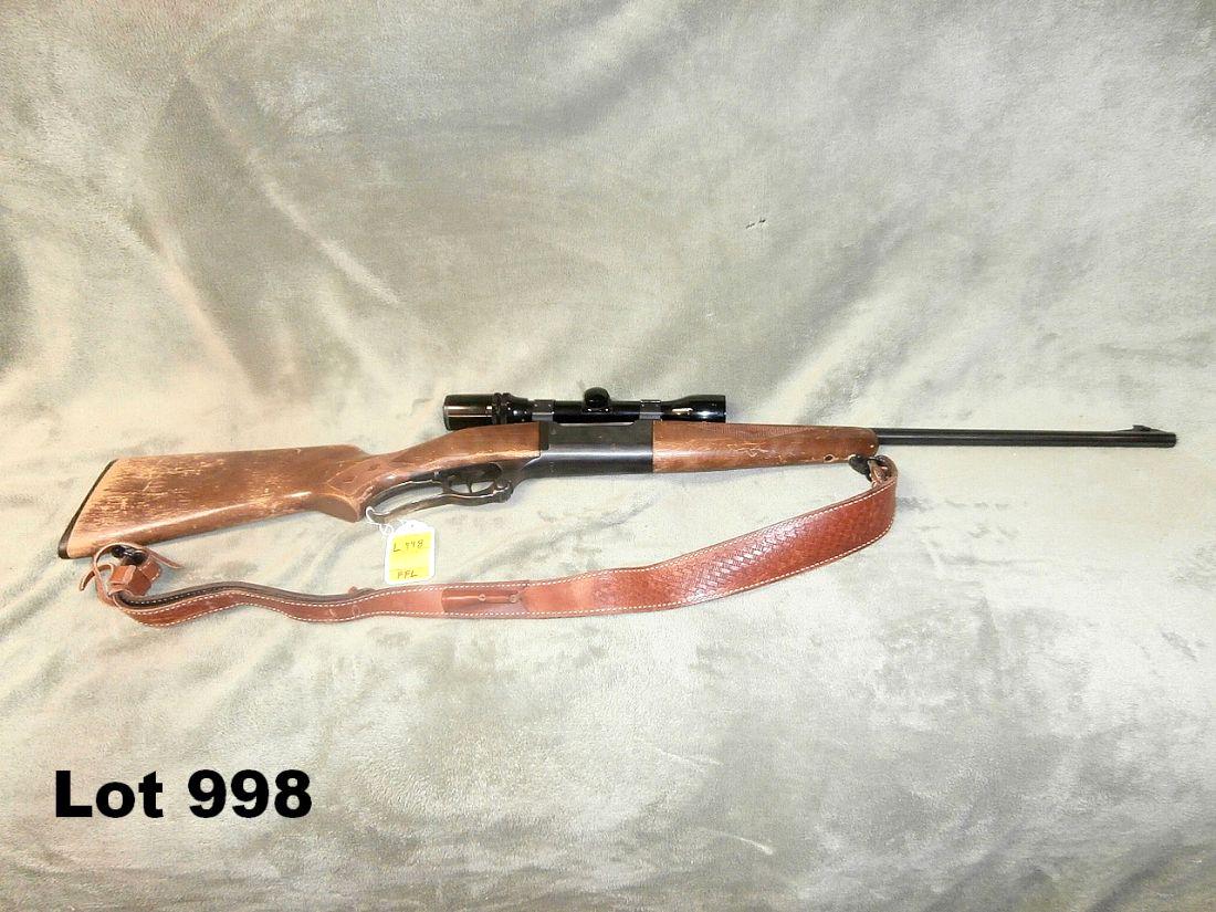 Savage Arms model 99E lever action rifle: Savage Arms model 99E 308winchester lever action rifle with scope in good to fair condition stock has some ware - FFL