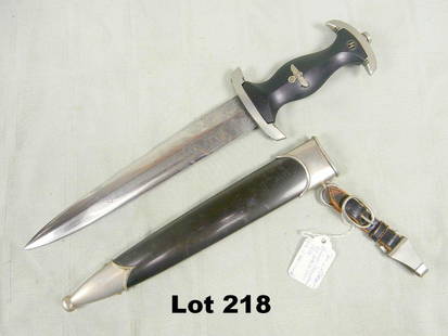 German WWII SS Waffen Himmler Presentation Dagger: German WWII SS Waffen Himmler presentation dagger engraved on both sides maker Carl Eickhorn Solingen 14 3/4 some pitting on the blade loose fit of handle