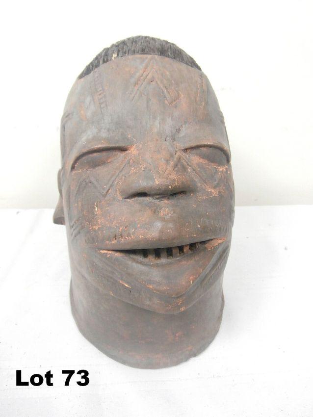 Carved Mask in the Round: Carved mask in the round. 10" tall.
