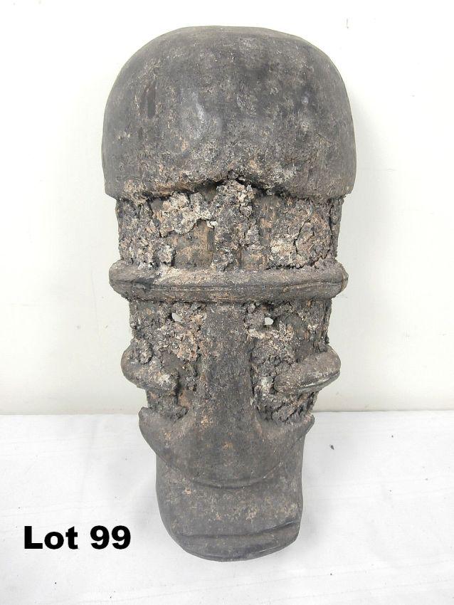 Carved Wooden Mask: Carved wooden mask. Decoration is disintegrating. 18.5" tall.