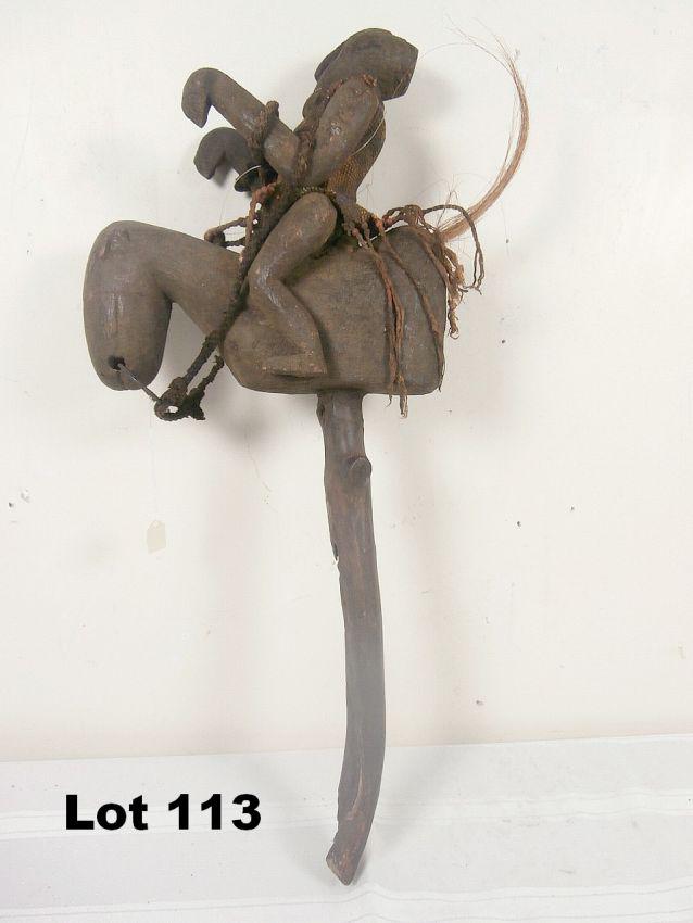 Carved Man on Horse Mounted on Staff: Carved man on horse mounted on staff. Bead and shell decoration. 11" tall. 25" tall with handle.