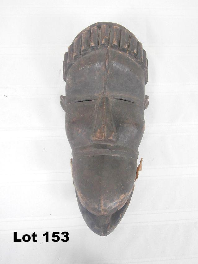 Guere Carved Wood Mask with Articulated Jaw: Guere carved wood mask wiith articulated jaw. Ivory Coast. 14" tall.