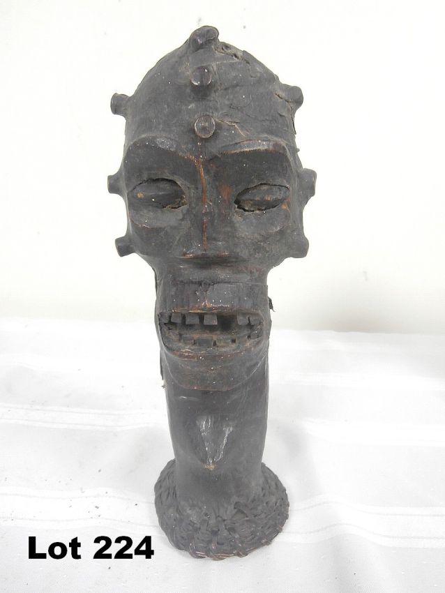 Head Rendered in Animal Hide: Head Rendered in Animal Hide. 10" tall.