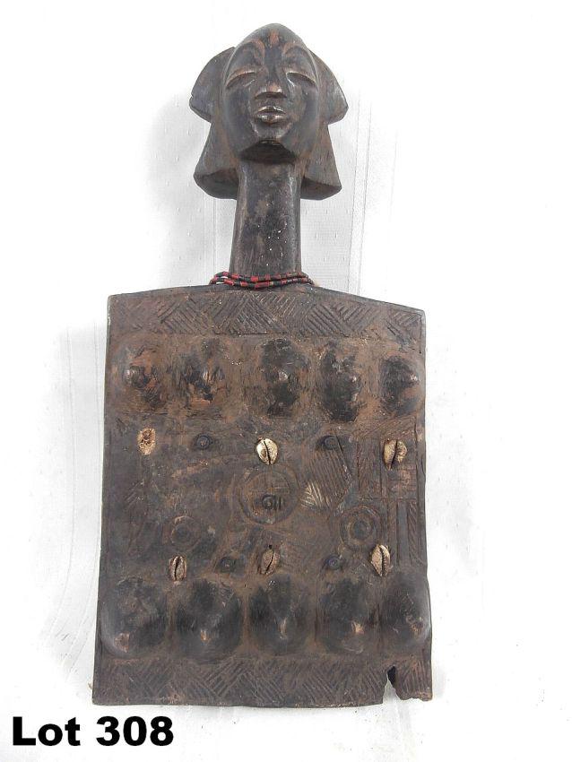 Carved Headed Wood Piece: Carved headed wood piece. 14.25" tall.