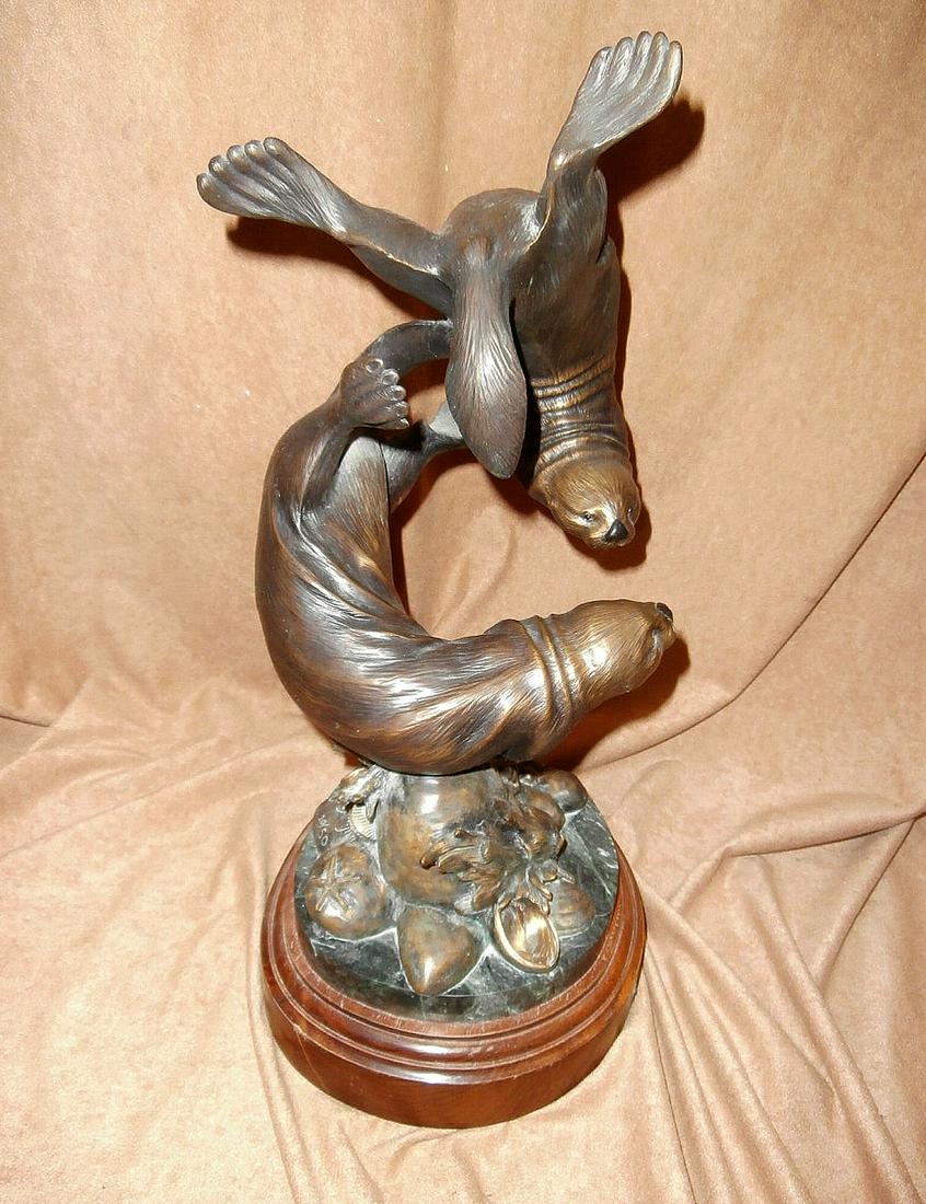 Bronze "Rhythm of the Sea" by Carole Danyluk: Limited edition bronze sculpture of "Rhythm of the Sea." #20 of 50 castings. 16.75" tall.