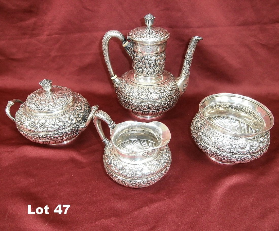 Tiffany Sterling Silver Tea Set: Tiffany 4 piece sterling silver tea set. Very ornate pattern. #1982 506M. 3-pint teapot, 1.5-pint covered sugar bowl and a 3.5-gills creamer, 1.5-pint waste bowl. Monogrammed on base. 64.3 troy oz.