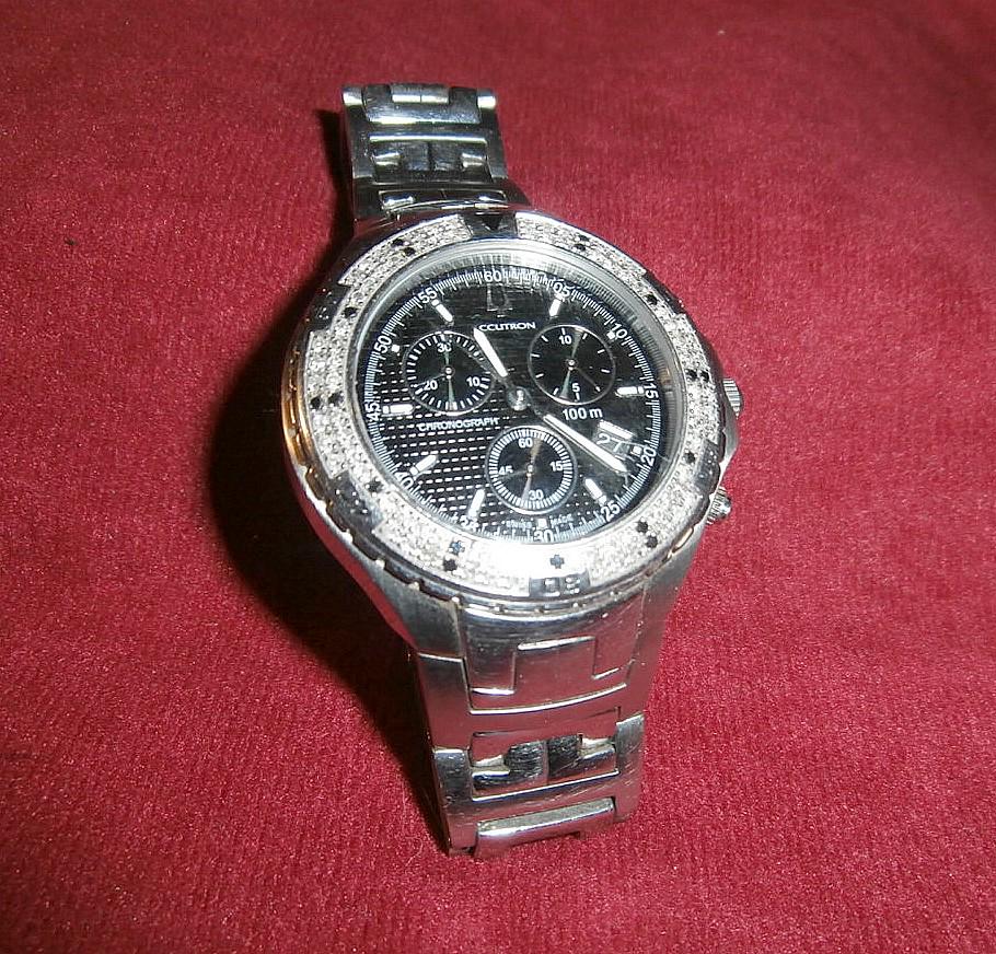 Bulova Accutron Wristwatch with 99 Diamond Bezel: Bulova Accutron wristwatch with 99 diamond bezel. Val D'isere chronograph. Model # 26E02. Ser. #1129348 on case.
