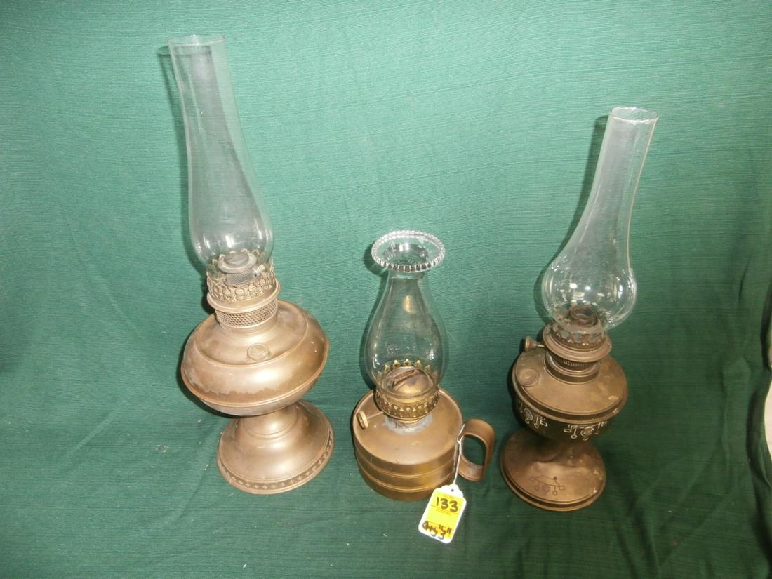 3 Oil Lamps, 1 signed RAYO. Various condition issues: Aprox. 21 inches tall (the tallest one)