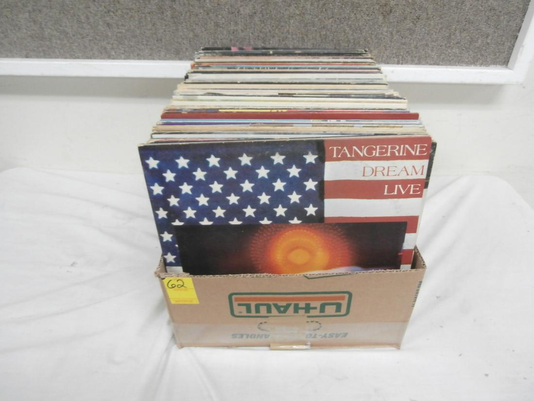 Record Lot: Estate Fresh Collection of Rock Albums: George Thorogood, Steely Dan, Carlos Santana, Rush, Areosmith, etc. Scuffs, discoloration throughout the covers, records show wear.