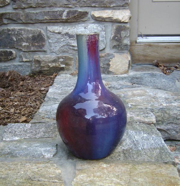 Chinese pottery vase: Chinese pottery bottle-neck vase, cobalt to oxblood glaze 13 inches high. Original condition. Firing mark on neck