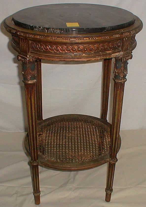 French Marble Top Table: Round French Marble Top Table with black marble. Original paint and stained shelf.