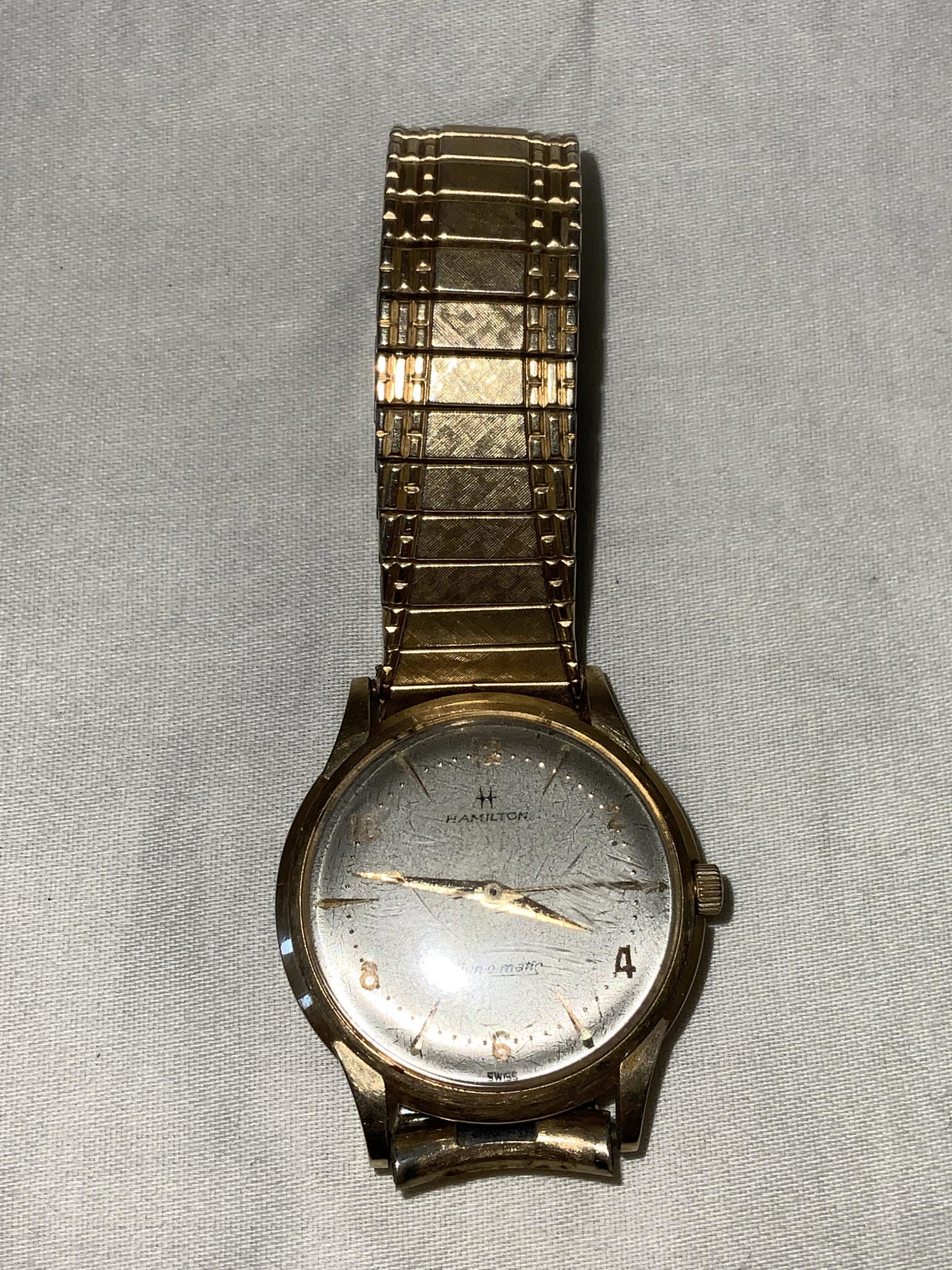 14 Hamilton Thin-O-Matic Watch: Monogramed on the back, Presentation script. Dated 1961. Gold Filled band. 1 3/8x1.5