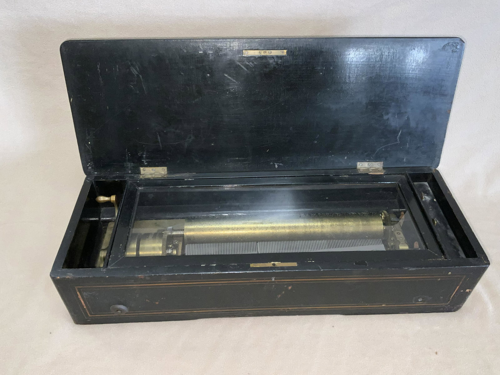 Swiss Music Box: 13 inch cylinder. In working order. The case is 25x9x6