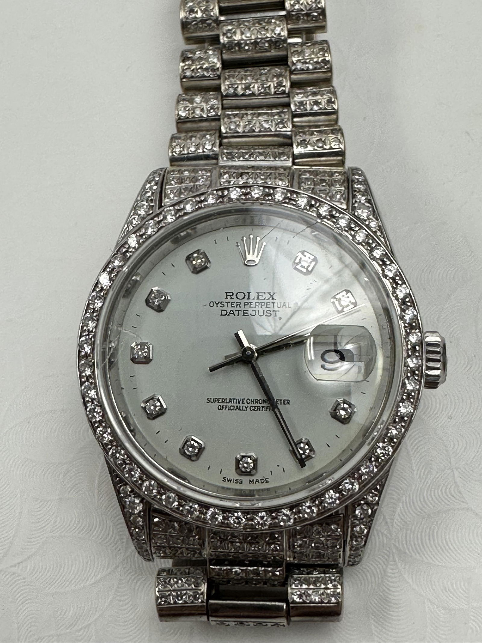 Rolex Oyster Perpetual Datejust Stainless Steel with Diamond Face with Diamond Bezel and Band: Rolex Oyster Perpetual Datejust with Diamond Face with Diamond Bezel and Band. Its Design 16220. Serial number A905073 Dates to 1999. The Rolex movement 3135 serial number 8482594. The Diamonds bezel