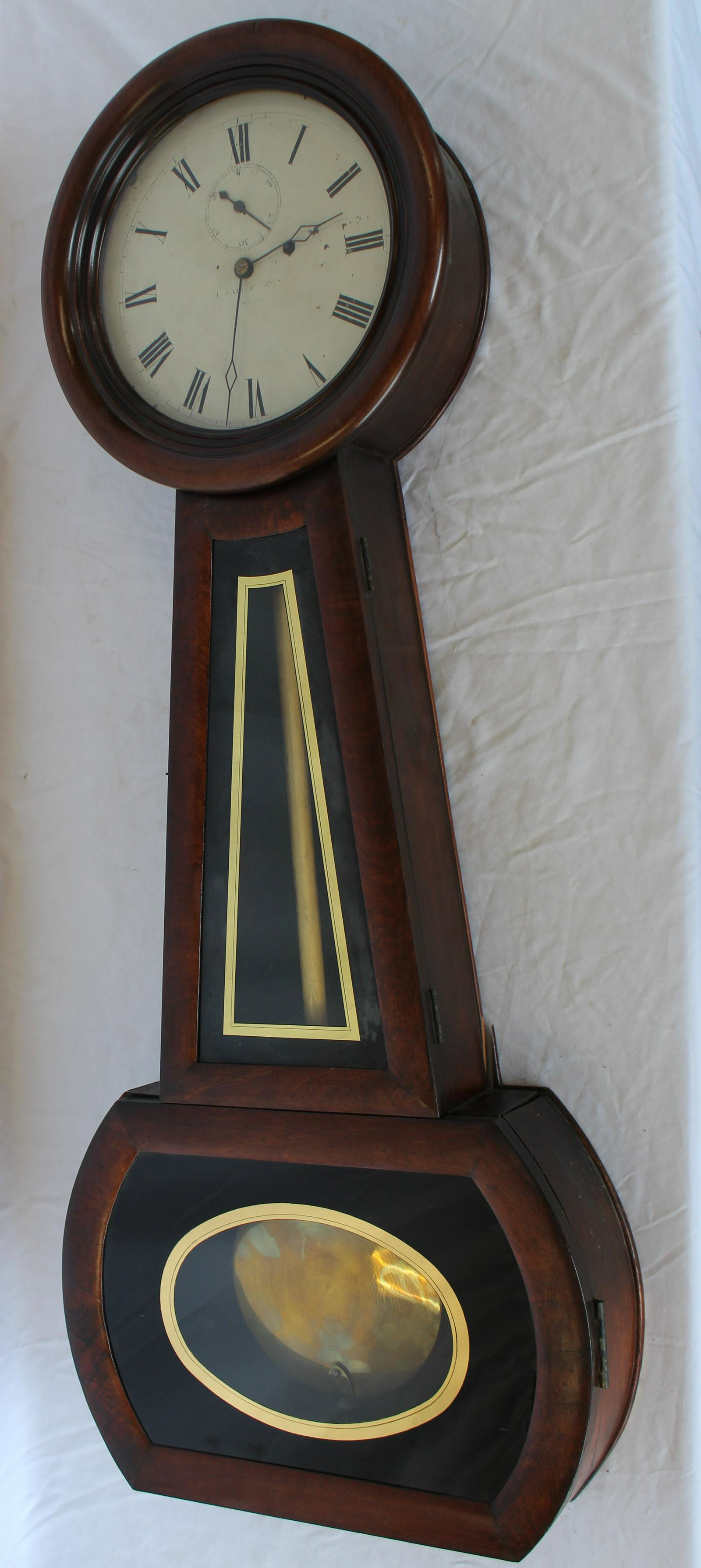 Howard and Davis No. 1 Weight Driven Banjo Clock: Howard and Davis No. 1 Weight Driven Banjo Clock. This Clock has walnut case. The glass is reverse painted black and gold. The case has an early repair. Was working order in the house. Unknown when th