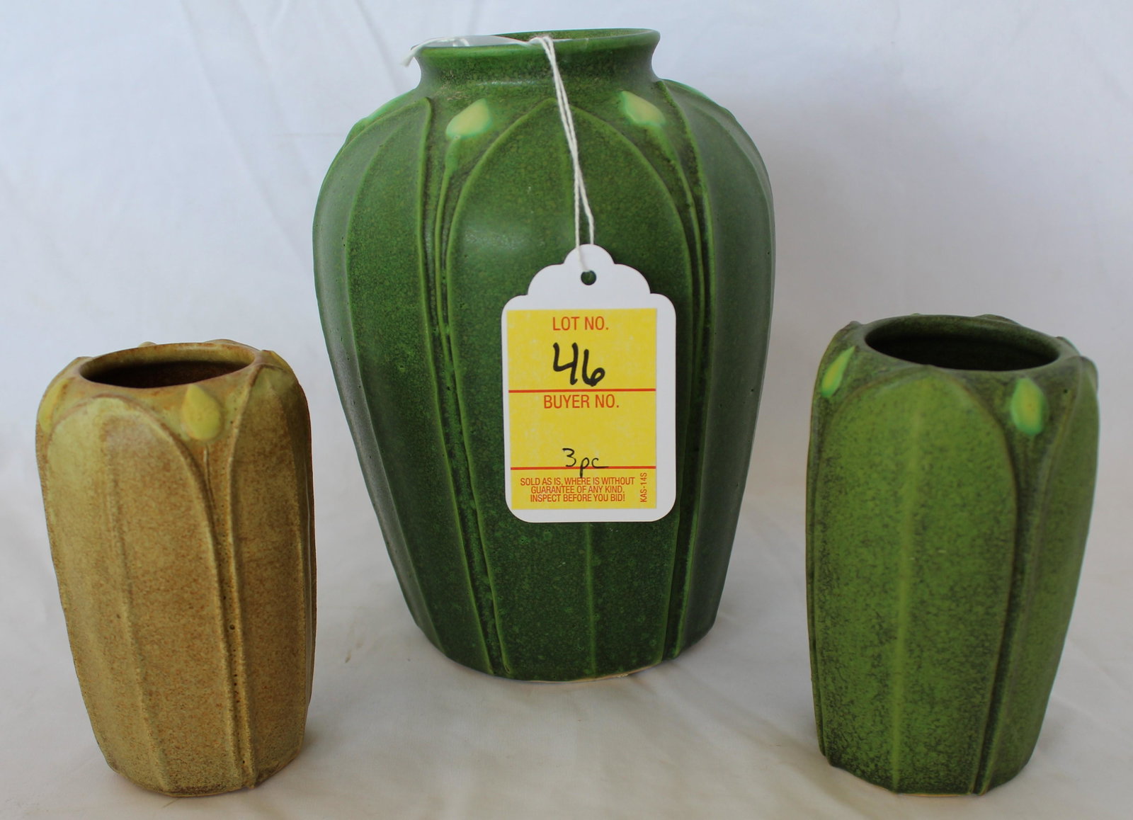3 Piece Lot of The Arts and Clay Company Green and Brown Vases: 3 Piece Lot of The Arts and Clay Company Green and Brown Vases. The tallest is 7 inches, small green is 4.5 inches, and the small brown is 4.25 inches. Two have paper labels