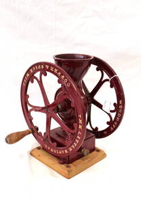 The Little National Coffee Grinder: The Little National Coffee Grinder by Woodruff and Edwards Co. It has been restored and repainted. Missing lid. 11.5" tall 9.5" wheel 9.75" wide