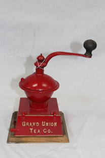 Griswold Coffee Mill Made For Grand Union Tea Co. *Revised Condition: Griswold Coffee Mill Made For Grand Union Tea Co. It has been restored and repainted. 11.5" tall The base is 6.75"x6.75" *A small piece of metal is missing in the hinge see photos for added detail.