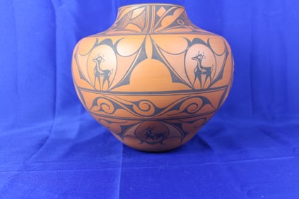 Handcrafted Zuni Pueblo Jar Featuring Geometric Deer's and Flowers Signed A. A. Peynetsa