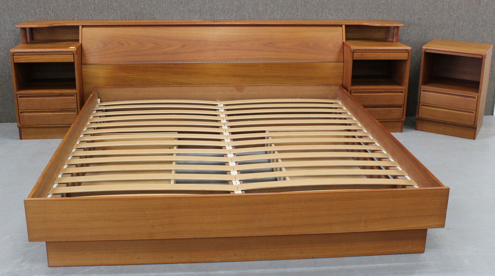 Torring Danish Modern Teak Platform Bed with Attached Night Stands and Side Table: Torring Danish Modern Teak Platform Bed with Attached Night Stands and Side Table. There are attached night stands with double drawers and a drink shelf, also there are two drawers underneath, there i