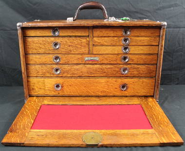 Union 71 8 drawer Machinist Tool Chest: Union 71 8 drawer Machinist Tool Chest. Fully restored oak tool chest with red felt lining, ring pull handles and front cover with lock that slides down into the bottom of the box; has keys. The