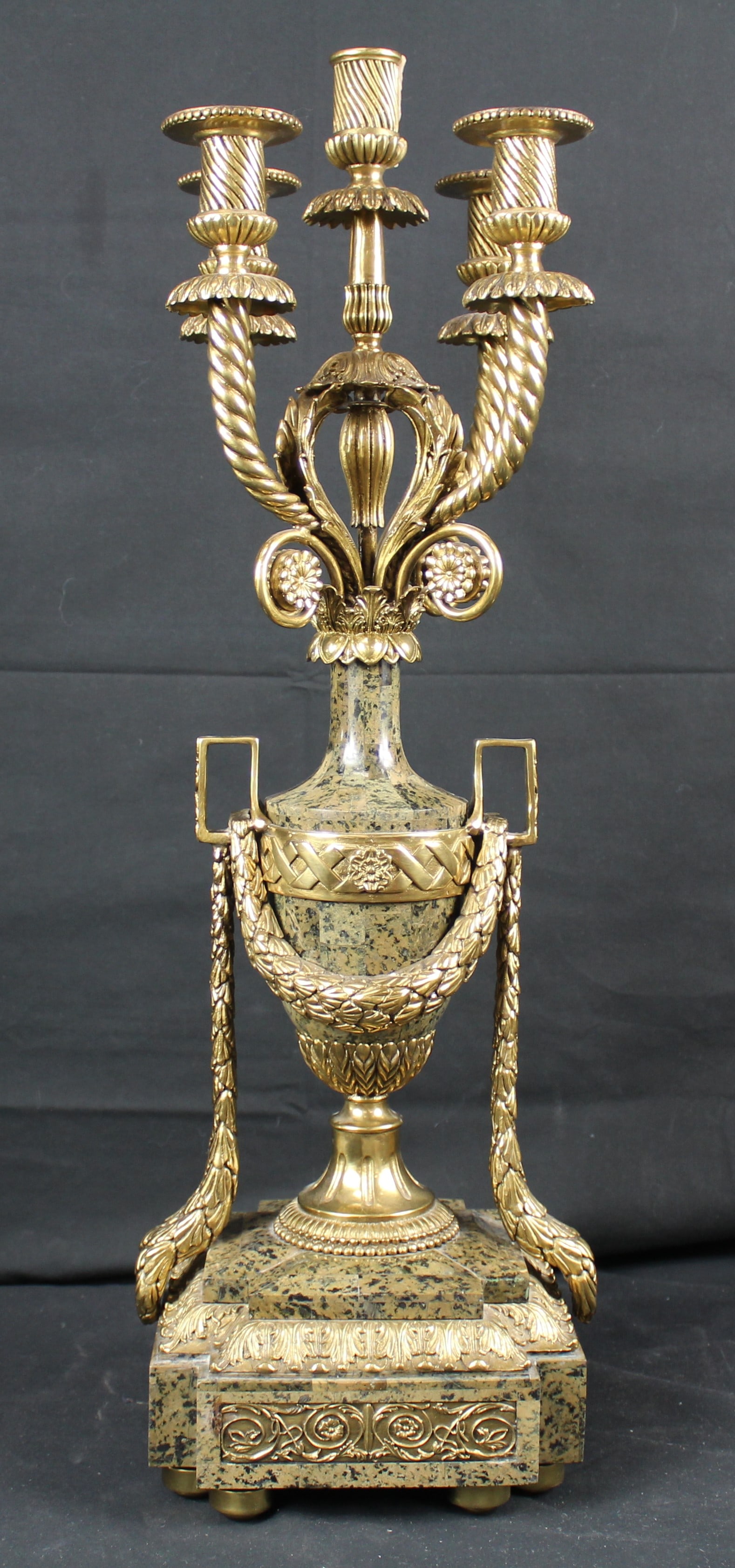 Maitland Smith Ornate Brass and Marbled Candelabra: Maitland Smith Ornate Brass and Marbled Candelabra. Beautiful large candelabra with gold agate made of what appears to be brass and brown marble that can hold up to five candles. Beautifully ornate fl
