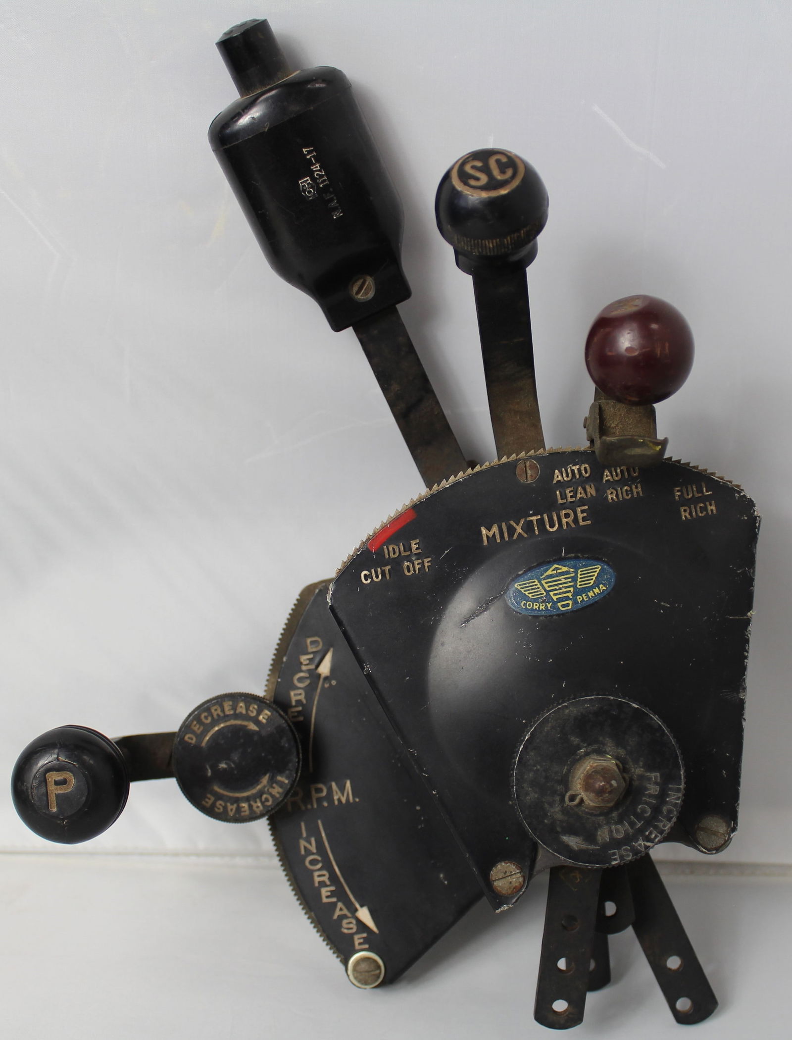Corry Penna Aero Throttle Quadrant: Corry Penna Aero Throttle Quadrant. Throttle quadrant most likely from a P47 Thunderbolt aircraft. The throttle quadrant consists of the main throttle, supercharge control, the mixture, control, and t