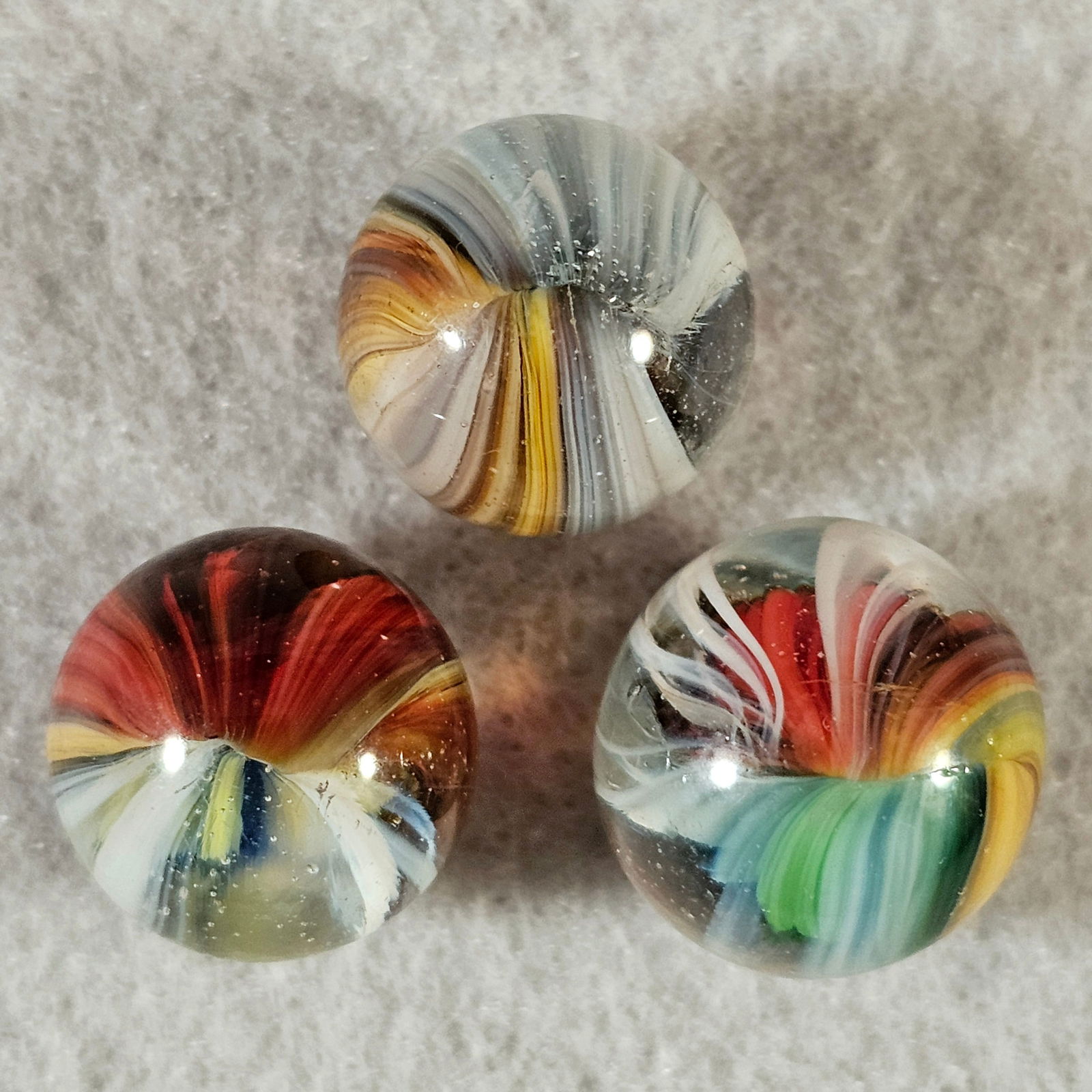 3 Akro Sparkler Marbles: 3 Akro Agate Sparkler Marbles. Left to right .623" Mint, .614 Mint(-) & .646 Near Mint
