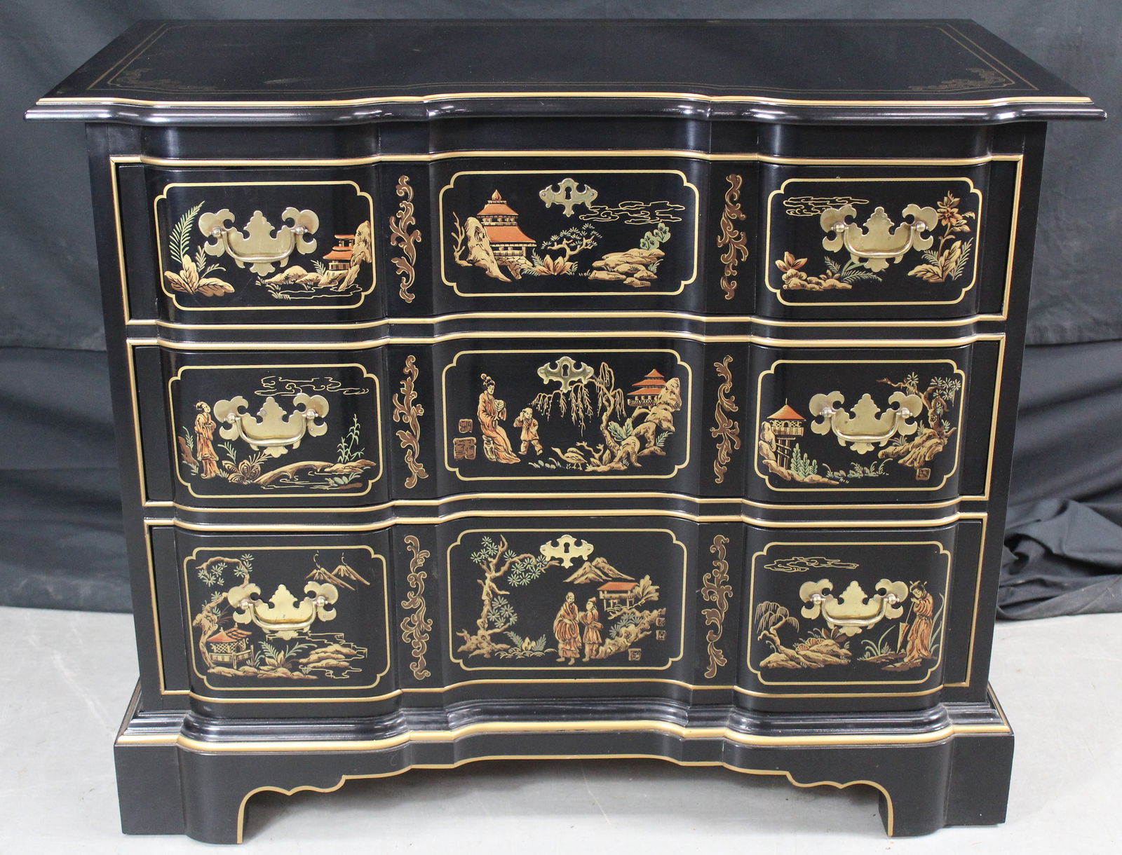 Drexel Heritage Asian Dresser: Drexel Heritage Asian Dresser. Beautiful black lacquer Asian Drexel 3 drawer chest with gold colored floral designs and panels on the drawers, top, and sides. The drawers have brass pull handles and