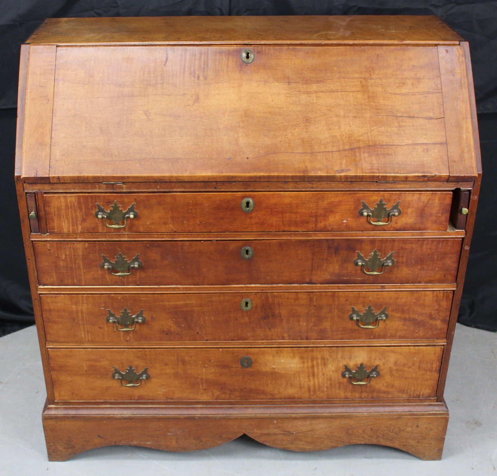 Antique Chippendale Slant Front Secretary Desk: Antique Chippendale Secretary Desk. Beautiful 2 piece slant front desk that consists of the desk and the base and when the desk is opened it reveals a writing surface, some drawers, and shelves. The d